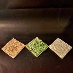 Ceramic Tiles Featuring Special Effect Glazes, Specifically "Lava" And "Lichen"